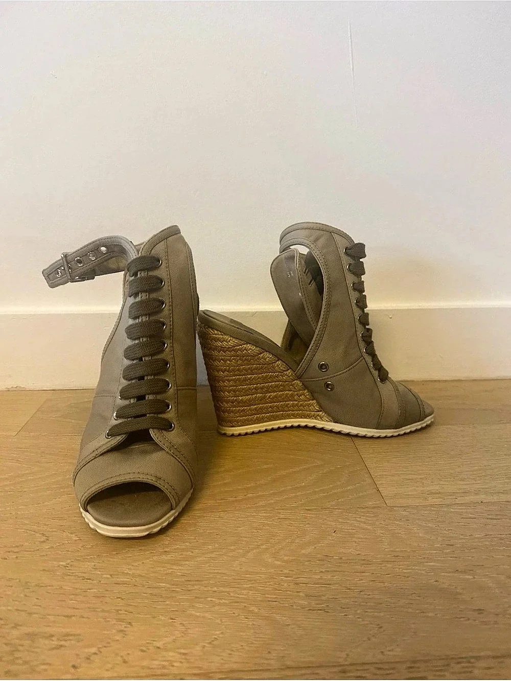 Prada Women's Wedge Sandals in Brown